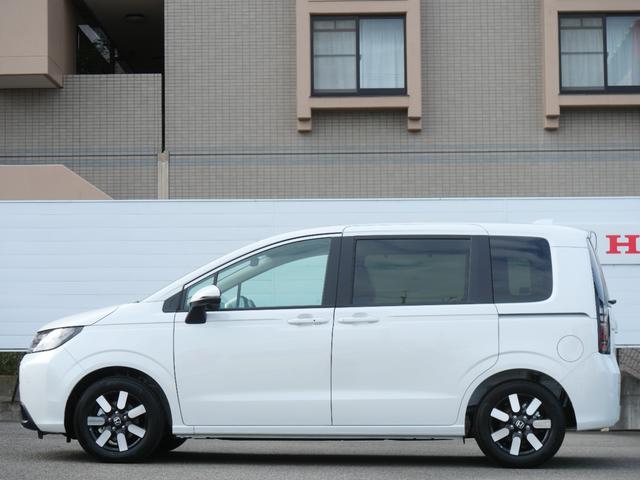 フリード e:HEVエアーEX 登録済未使用車 【いまコレ+】新品ナビ、新品マット ホンダセンシング 9インチナビ バックカメラ ETC2.0 2列目USB充電器 両側電動スライド シートヒーター 電子パーキング LEDヘッドライト(7枚目)