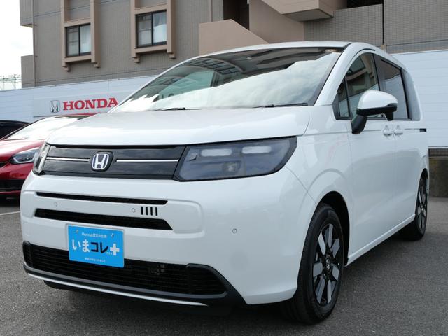 フリード e:HEVエアーEX 登録済未使用車 【いまコレ+】新品ナビ、新品マット ホンダセンシング 9インチナビ バックカメラ ETC2.0 2列目USB充電器 両側電動スライド シートヒーター 電子パーキング LEDヘッドライト(10枚目)