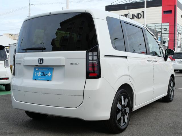 フリード e:HEVエアーEX 登録済未使用車 【いまコレ+】新品ナビ、新品マット ホンダセンシング 9インチナビ バックカメラ ETC2.0 2列目USB充電器 両側電動スライド シートヒーター 電子パーキング LEDヘッドライト(11枚目)