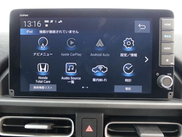 フリード e:HEVエアーEX 登録済未使用車 【いまコレ+】新品ナビ、新品マット ホンダセンシング 9インチナビ バックカメラ ETC2.0 2列目USB充電器 両側電動スライド シートヒーター 電子パーキング LEDヘッドライト(20枚目)