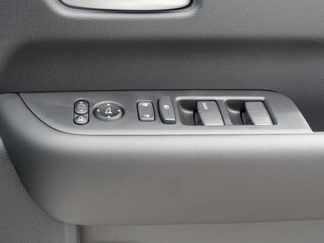 フリード e:HEVエアーEX 登録済未使用車 【いまコレ+】新品ナビ、新品マット ホンダセンシング 9インチナビ バックカメラ ETC2.0 2列目USB充電器 両側電動スライド シートヒーター 電子パーキング LEDヘッドライト(30枚目)