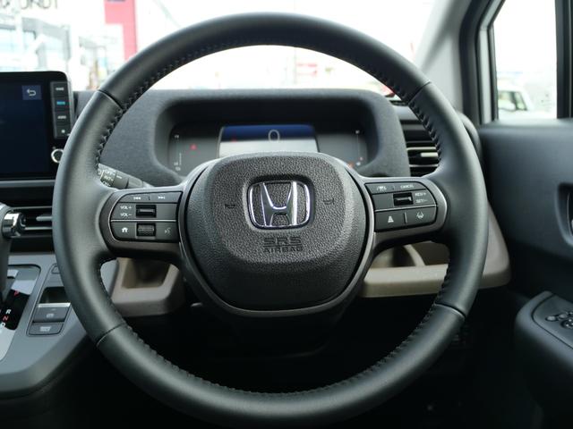 フリード e:HEVエアーEX 登録済未使用車 【いまコレ+】新品ナビ、新品マット ホンダセンシング 9インチナビ バックカメラ ETC2.0 2列目USB充電器 両側電動スライド シートヒーター 電子パーキング LEDヘッドライト(34枚目)