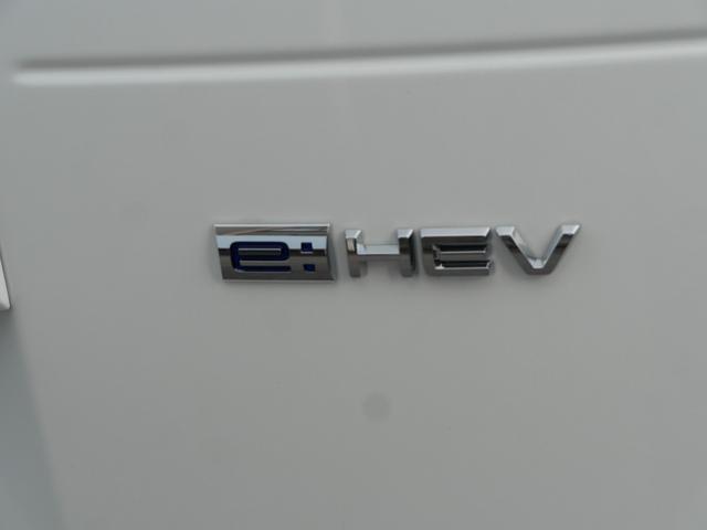 フリード e:HEVエアーEX 登録済未使用車 【いまコレ+】新品ナビ、新品マット ホンダセンシング 9インチナビ バックカメラ ETC2.0 2列目USB充電器 両側電動スライド シートヒーター 電子パーキング LEDヘッドライト(61枚目)