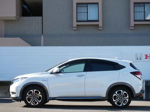 ヴェゼル ＨＶＸ・ホンダセンシングブリリアントスタイルＥＤ　ワンオーナー　８インチナビ　ホンダセンシング　リアカメラＤＥあんしんプラス　バックカメラ　ＨＤＭＩ　ＥＴＣ　ナビ連動フロントドラレコ　電子パーキング　オートリトラミラー　ルーフレール　ＬＥＤライト（6枚目）