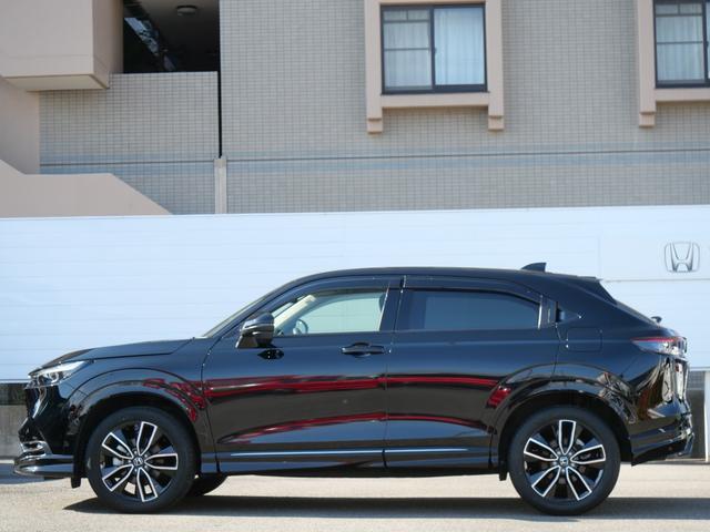 ヴェゼル ｅ：ＨＥＶＺ　ワンオーナー　ホンダセンシング　ナビ　マルチビューカメラ　ＥＴＣ２．０　プレミアムサウンド　ワイヤレス充電器　ドラレコ前後　シートヒーター　ハンドルヒーター　パワーバックドア　ＬＥＤライト　無限エアロ（6枚目）