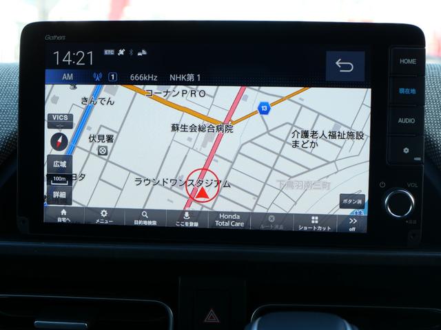 フリード e:HEVエアーEX 登録済未使用車 9インチコネクトナビ マルチビューカメラ USB ETC2.0 ホンダセンシング 両側電動スライドドア 15インチアルミホイール シートヒーター 電子パーキングブレーキ バックカメラ(3枚目)