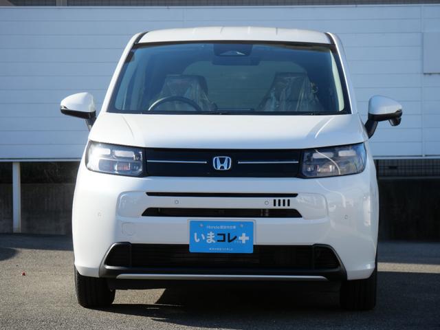 フリード e:HEVエアーEX 登録済未使用車 9インチコネクトナビ マルチビューカメラ USB ETC2.0 ホンダセンシング 両側電動スライドドア 15インチアルミホイール シートヒーター 電子パーキングブレーキ バックカメラ(6枚目)