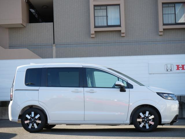 フリード e:HEVエアーEX 登録済未使用車 9インチコネクトナビ マルチビューカメラ USB ETC2.0 ホンダセンシング 両側電動スライドドア 15インチアルミホイール シートヒーター 電子パーキングブレーキ バックカメラ(9枚目)