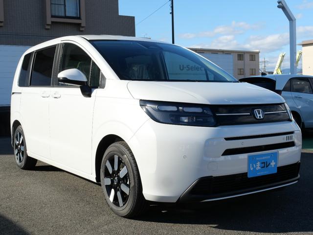 フリード e:HEVエアーEX 登録済未使用車 9インチコネクトナビ マルチビューカメラ USB ETC2.0 ホンダセンシング 両側電動スライドドア 15インチアルミホイール シートヒーター 電子パーキングブレーキ バックカメラ(10枚目)