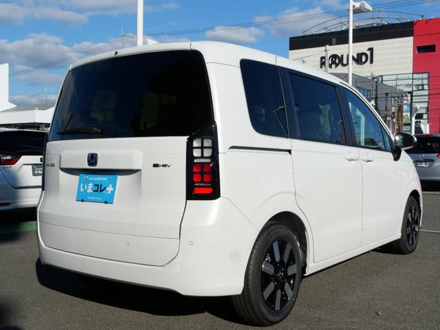 フリード e:HEVエアーEX 登録済未使用車 9インチコネクトナビ マルチビューカメラ USB ETC2.0 ホンダセンシング 両側電動スライドドア 15インチアルミホイール シートヒーター 電子パーキングブレーキ バックカメラ(12枚目)