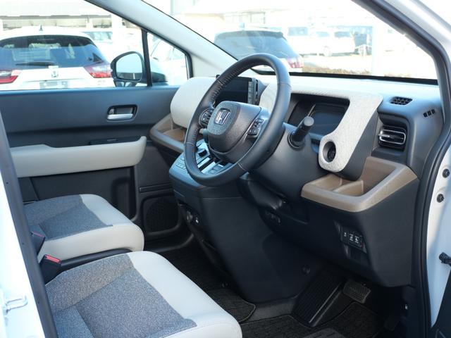 フリード e:HEVエアーEX 登録済未使用車 9インチコネクトナビ マルチビューカメラ USB ETC2.0 ホンダセンシング 両側電動スライドドア 15インチアルミホイール シートヒーター 電子パーキングブレーキ バックカメラ(14枚目)