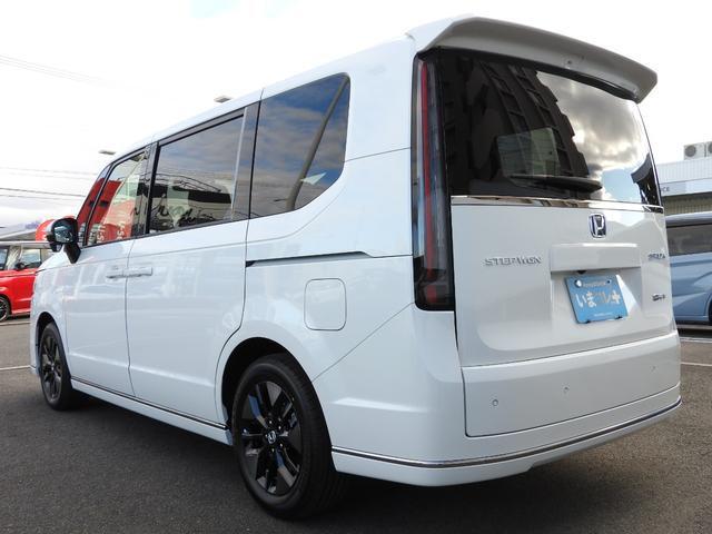 ステップワゴン e:HEVスパーダ 登録済未使用車 いまコレ+「新品ナビ、新品マット」 ホンダセンシング 11.4インチナビ バックカメラ ETC2.0 2列目オットマンシート 両側電動スライド パワーテールゲート LEDヘッドライト(12枚目)