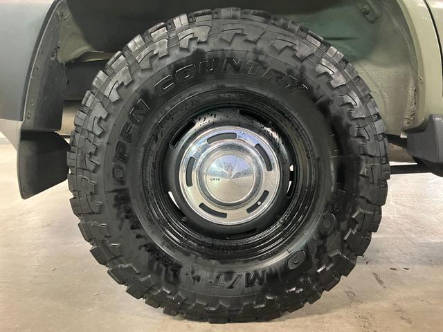ランドクルーザー100 VXリミテッド カーキ全塗装済 丸目ヘッド換装 DEAN16インチAW TOYOオープンカントリーMTタイヤ TOYOTAグリル サイドステップ ウッドコンビステア SDナビTVバックカメラ シートカバー キーレス(16枚目)