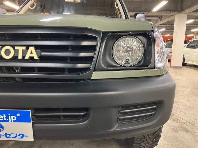 ランドクルーザー100 VXリミテッド カーキ全塗装済 丸目ヘッド換装 DEAN16インチAW TOYOオープンカントリーMTタイヤ TOYOTAグリル サイドステップ ウッドコンビステア SDナビTVバックカメラ シートカバー キーレス(19枚目)