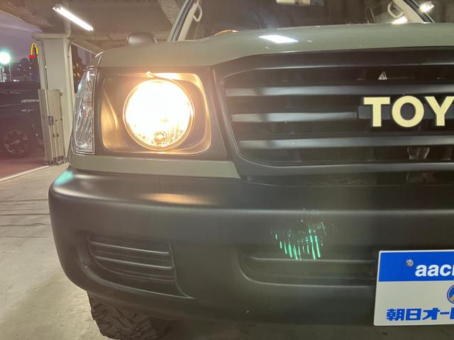 ランドクルーザー100 VXリミテッド カーキ全塗装済 丸目ヘッド換装 DEAN16インチAW TOYOオープンカントリーMTタイヤ TOYOTAグリル サイドステップ ウッドコンビステア SDナビTVバックカメラ シートカバー キーレス(20枚目)