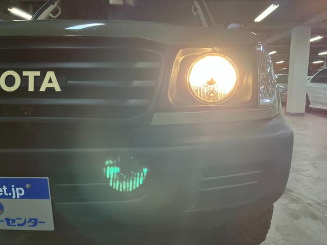 ランドクルーザー100 VXリミテッド カーキ全塗装済 丸目ヘッド換装 DEAN16インチAW TOYOオープンカントリーMTタイヤ TOYOTAグリル サイドステップ ウッドコンビステア SDナビTVバックカメラ シートカバー キーレス(21枚目)