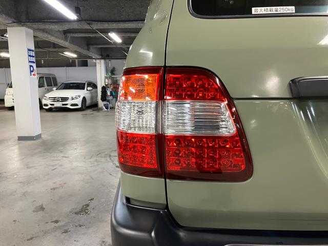 ランドクルーザー100 VXリミテッド カーキ全塗装済 丸目ヘッド換装 DEAN16インチAW TOYOオープンカントリーMTタイヤ TOYOTAグリル サイドステップ ウッドコンビステア SDナビTVバックカメラ シートカバー キーレス(22枚目)