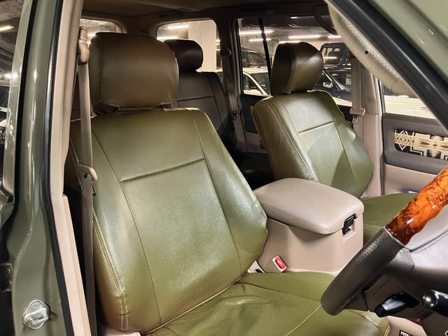 ランドクルーザー100 VXリミテッド カーキ全塗装済 丸目ヘッド換装 DEAN16インチAW TOYOオープンカントリーMTタイヤ TOYOTAグリル サイドステップ ウッドコンビステア SDナビTVバックカメラ シートカバー キーレス(41枚目)