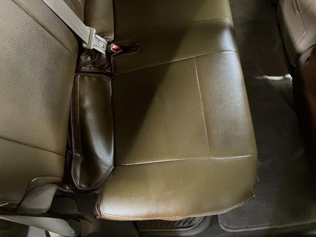 ランドクルーザー100 VXリミテッド カーキ全塗装済 丸目ヘッド換装 DEAN16インチAW TOYOオープンカントリーMTタイヤ TOYOTAグリル サイドステップ ウッドコンビステア SDナビTVバックカメラ シートカバー キーレス(46枚目)