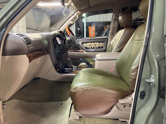 ランドクルーザー100 VXリミテッド カーキ全塗装済 丸目ヘッド換装 DEAN16インチAW TOYOオープンカントリーMTタイヤ TOYOTAグリル サイドステップ ウッドコンビステア SDナビTVバックカメラ シートカバー キーレス(48枚目)