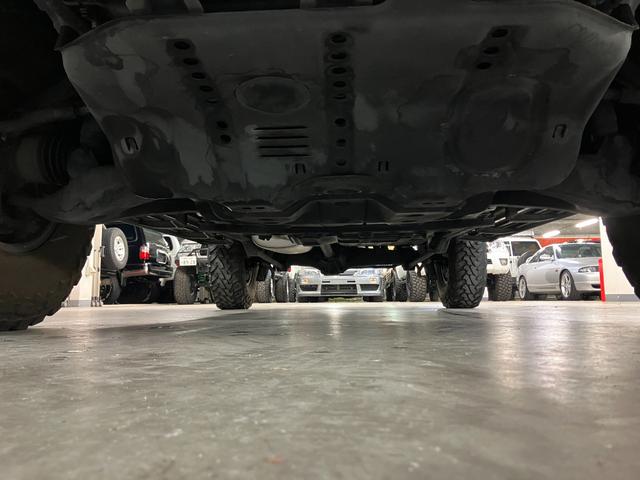 ランドクルーザー100 VXリミテッド カーキ全塗装済 丸目ヘッド換装 DEAN16インチAW TOYOオープンカントリーMTタイヤ TOYOTAグリル サイドステップ ウッドコンビステア SDナビTVバックカメラ シートカバー キーレス(65枚目)