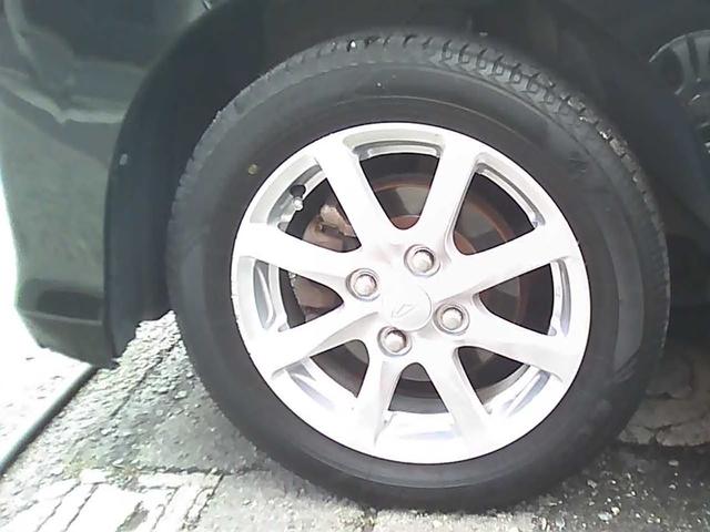 ムーヴ カスタム Xリミテッド SA ナビゲーション ワンセグTV バックカメラ スマートキー wエアバック ウインカーミラー 電動格納ミラー ドアバイザー HIDヘッドライト リアスポイラー 純正14インチアルミホイール ABS(33枚目)