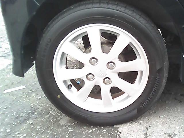 タント カスタムX 社外ナビゲーション フルセグTV ETC スマートキー 純正14インチアルミホイール HIDヘッドライト ウインカーミラー 電動格納ミラー 片側スライドドア ドアバイザー リアスポイラー ABS(24枚目)