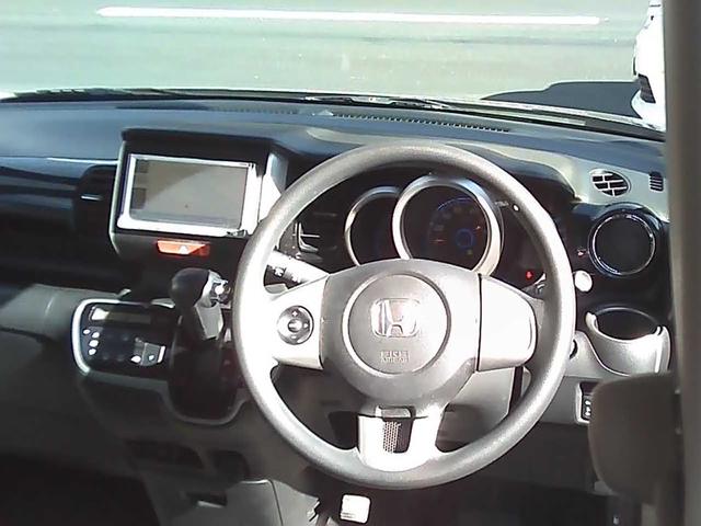 Ｎ－ＢＯＸカスタム Ｇ・Ｌパッケージ　社外ナビゲーション　ワンセグＴＶ　ＥＴＣ　スマートキー　純正１４インチアルミホイール　エアロパーツ　両側スライドドア　片側パワースライドドア　リアスポイラー　ドアバイザー　ウインカーミラー　ＡＢＳ（14枚目）