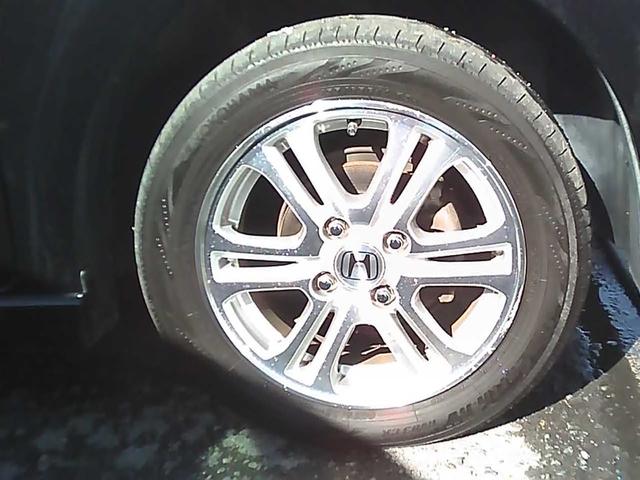 Ｎ－ＢＯＸカスタム Ｇ・Ｌパッケージ　社外ナビゲーション　ワンセグＴＶ　ＥＴＣ　スマートキー　純正１４インチアルミホイール　エアロパーツ　両側スライドドア　片側パワースライドドア　リアスポイラー　ドアバイザー　ウインカーミラー　ＡＢＳ（24枚目）