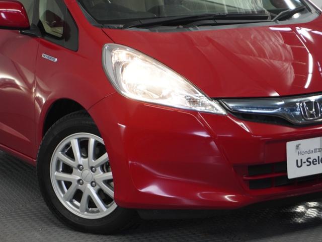 フィットハイブリッド スマートセレクション　純正ナビゲーション／バックカメラ／ワンセグＴＶ／ミュージックプレーヤー接続／ＤＶＤ再生／ＥＴＣ車載器／クルーズコントロール／スマートキー／オートエアコン／盗難防止システム／横滑り制御装置／電動格ミラー（27枚目）