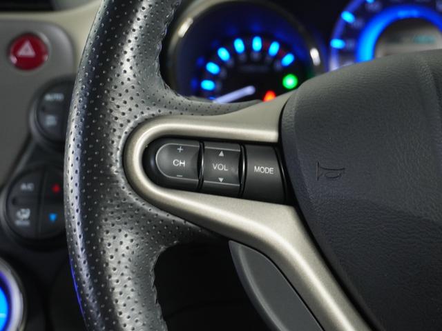 フィットハイブリッド スマートセレクション　純正ナビゲーション／バックカメラ／ワンセグＴＶ／ミュージックプレーヤー接続／ＤＶＤ再生／ＥＴＣ車載器／クルーズコントロール／スマートキー／オートエアコン／盗難防止システム／横滑り制御装置／電動格ミラー（49枚目）