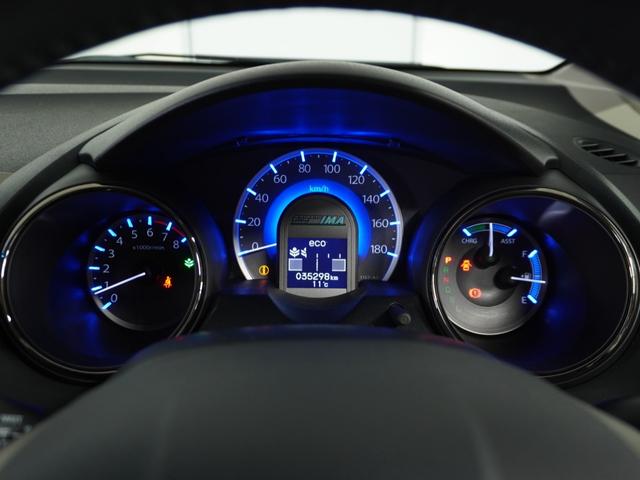 フィットハイブリッド スマートセレクション　純正ナビゲーション／バックカメラ／ワンセグＴＶ／ミュージックプレーヤー接続／ＤＶＤ再生／ＥＴＣ車載器／クルーズコントロール／スマートキー／オートエアコン／盗難防止システム／横滑り制御装置／電動格ミラー（53枚目）