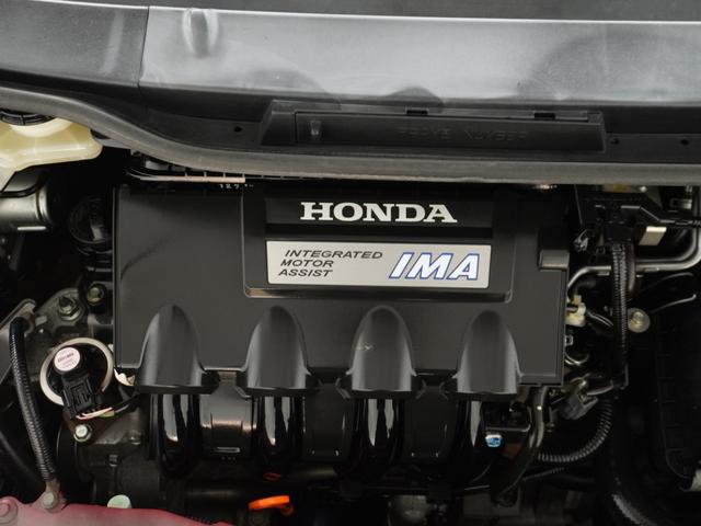 フィットハイブリッド スマートセレクション　純正ナビゲーション／バックカメラ／ワンセグＴＶ／ミュージックプレーヤー接続／ＤＶＤ再生／ＥＴＣ車載器／クルーズコントロール／スマートキー／オートエアコン／盗難防止システム／横滑り制御装置／電動格ミラー（63枚目）