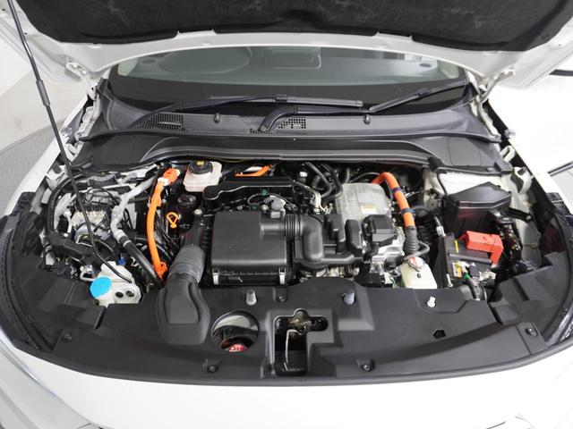 ヴェゼル ｅ：ＨＥＶＺ　１オ－ナ－ナビＤレコＲカメＥＴＣ２．０クルコン　渋滞追従クルーズ　Ｂｌｕｅｔｏｏｔｈ　ハンドルヒーター　障害物センサー　シートヒーター　ダウンヒルアシスト　デイライト　ブラインドスポット　禁煙車（20枚目）