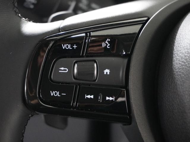 ヴェゼル ｅ：ＨＥＶＺ　１オ－ナ－ナビＤレコＲカメＥＴＣ２．０クルコン　渋滞追従クルーズ　Ｂｌｕｅｔｏｏｔｈ　ハンドルヒーター　障害物センサー　シートヒーター　ダウンヒルアシスト　デイライト　ブラインドスポット　禁煙車（52枚目）