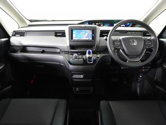 フリード+ハイブリッド ハイブリッドG・ホンダセンシング 1オ-ナ-ナビRカメETC両電扉BTクルコン アダプティブクルーズコントロール Bluetooth LEDヘッドライト レーンアシスト サイド/サイドカーテンエアバッグ 禁煙車 スペアキー有 DVD(7枚目)