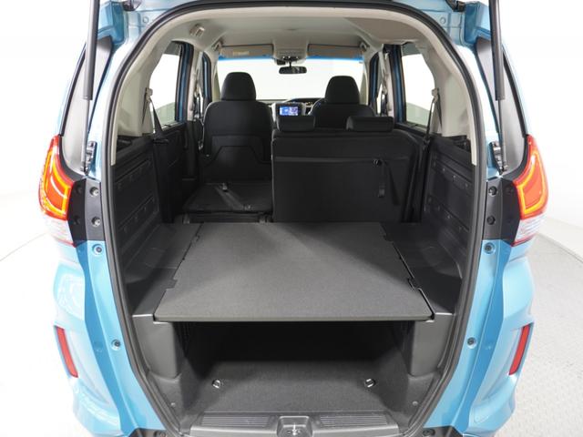 フリード+ハイブリッド ハイブリッドG・ホンダセンシング 1オ-ナ-ナビRカメETC両電扉BTクルコン アダプティブクルーズコントロール Bluetooth LEDヘッドライト レーンアシスト サイド/サイドカーテンエアバッグ 禁煙車 スペアキー有 DVD(35枚目)