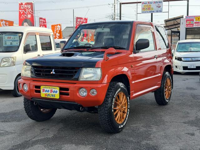 パジェロミニ Ｖ　凹みあり車両　売切御免　タイミングベルト交換　５ＭＴ　４ＷＤ　ナブゲーション　リフトアップ　社外アルミ　ターボタイマー　過給機メーター　キーレス　ＥＴＣ　オリジナル塗装（3枚目）