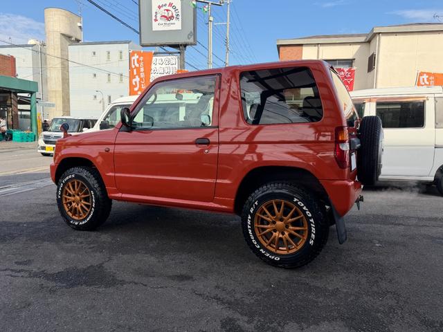 パジェロミニ Ｖ　凹みあり車両　売切御免　タイミングベルト交換　５ＭＴ　４ＷＤ　ナブゲーション　リフトアップ　社外アルミ　ターボタイマー　過給機メーター　キーレス　ＥＴＣ　オリジナル塗装（35枚目）