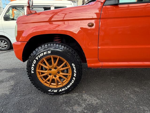 パジェロミニ Ｖ　凹みあり車両　売切御免　タイミングベルト交換　５ＭＴ　４ＷＤ　ナブゲーション　リフトアップ　社外アルミ　ターボタイマー　過給機メーター　キーレス　ＥＴＣ　オリジナル塗装（60枚目）