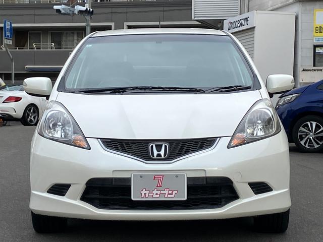 フィット RS ハイウェイエディション 純正ワンセグナビ ETC Bカメラ ユーザー買取車 禁煙車 キーレス スペアキー 社外16インチアルミホイール 純正フロアマット 純正ドアバイザー HIDヘッドライト オートエアコン ウインカーミラー(2枚目)