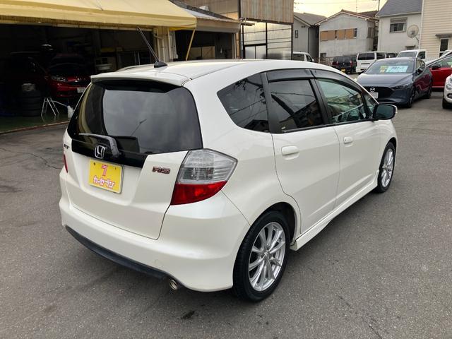 フィット RS ハイウェイエディション 純正ワンセグナビ ETC Bカメラ ユーザー買取車 禁煙車 キーレス スペアキー 社外16インチアルミホイール 純正フロアマット 純正ドアバイザー HIDヘッドライト オートエアコン ウインカーミラー(6枚目)