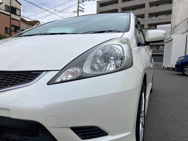 フィット RS ハイウェイエディション 純正ワンセグナビ ETC Bカメラ ユーザー買取車 禁煙車 キーレス スペアキー 社外16インチアルミホイール 純正フロアマット 純正ドアバイザー HIDヘッドライト オートエアコン ウインカーミラー(10枚目)