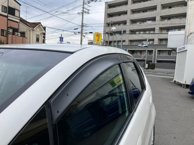 フィット RS ハイウェイエディション 純正ワンセグナビ ETC Bカメラ ユーザー買取車 禁煙車 キーレス スペアキー 社外16インチアルミホイール 純正フロアマット 純正ドアバイザー HIDヘッドライト オートエアコン ウインカーミラー(14枚目)