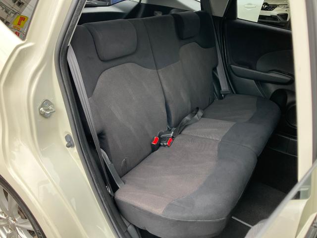 フィット RS ハイウェイエディション 純正ワンセグナビ ETC Bカメラ ユーザー買取車 禁煙車 キーレス スペアキー 社外16インチアルミホイール 純正フロアマット 純正ドアバイザー HIDヘッドライト オートエアコン ウインカーミラー(38枚目)