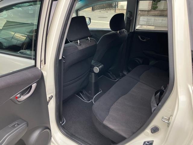 フィット RS ハイウェイエディション 純正ワンセグナビ ETC Bカメラ ユーザー買取車 禁煙車 キーレス スペアキー 社外16インチアルミホイール 純正フロアマット 純正ドアバイザー HIDヘッドライト オートエアコン ウインカーミラー(39枚目)