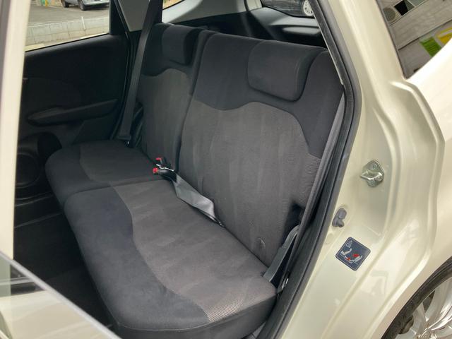 フィット RS ハイウェイエディション 純正ワンセグナビ ETC Bカメラ ユーザー買取車 禁煙車 キーレス スペアキー 社外16インチアルミホイール 純正フロアマット 純正ドアバイザー HIDヘッドライト オートエアコン ウインカーミラー(40枚目)