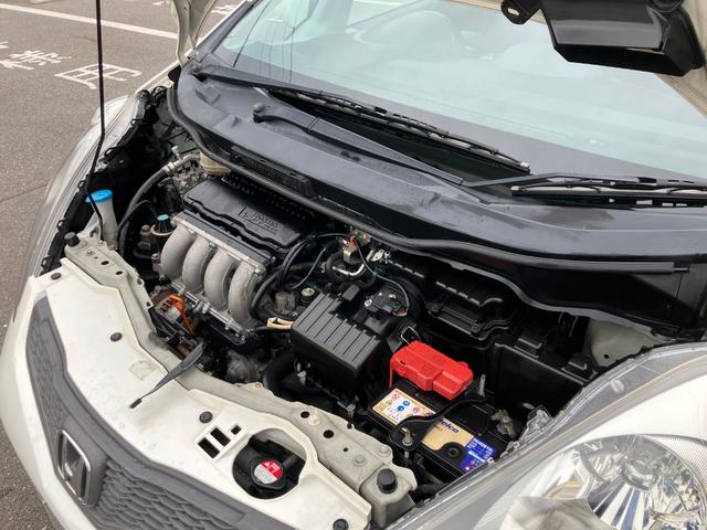 フィット RS ハイウェイエディション 純正ワンセグナビ ETC Bカメラ ユーザー買取車 禁煙車 キーレス スペアキー 社外16インチアルミホイール 純正フロアマット 純正ドアバイザー HIDヘッドライト オートエアコン ウインカーミラー(55枚目)