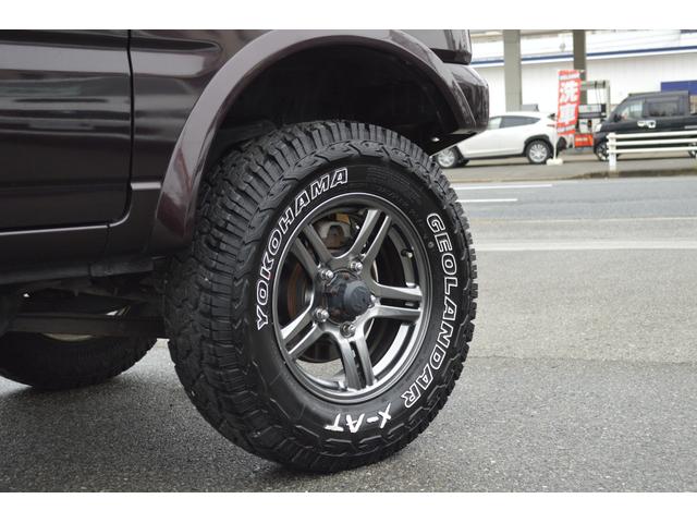 ジムニー クロスアドベンチャー　カスタムペイント　リフトアップ　１６インチアルミ＆ジオランダーＸ－ＡＴ　ＨＫＳマフラー　ショートバンパー　オーバーフェンダー　デジタルインナーミラー　外テールライト　フルレザーシート　シートヒーター（13枚目）