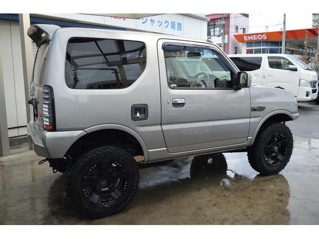 ジムニー 　リフトアップ　ＲＰＧショック　Ｂｒａｔ１６インチアルミ＆ジーランダーＭ／Ｔ　前後ショートバンパー　Ｌｉｎｋｓマフラー　Ｂｒａｔリアスポイラー　社外リアテール　クオーレモジュレシート　ＳＤナビＴＶ（5枚目）